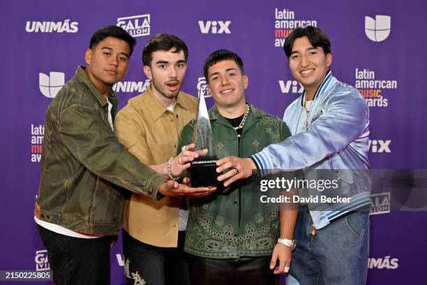 Ulises Gonzalez, Brian Tovar, Pedro Tovar and Damian Pacheco of Eslabon Armado, winners of the "Best Collaboration – Regional Mexican" award for...