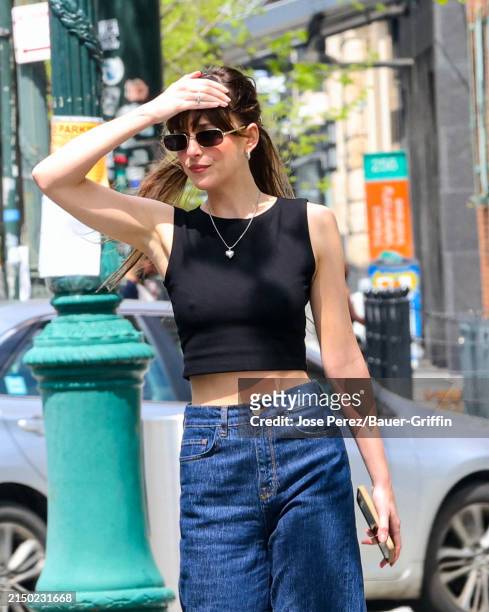 Dakota Johnson is seen at the movie set of the 'Materialists' on April 29, 2024 in New York City.