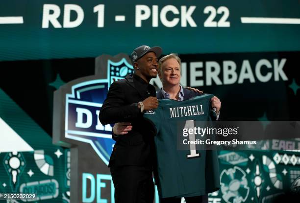 Quinyon Mitchell poses with NFL Commissioner Roger Goodell after being selected 22nd overall by the Philadelphia Eagles during the first round of the...