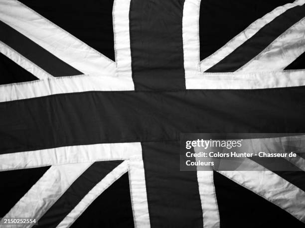 close-up in black and white of the union jack, the flag of the united kingdom. phtograph taken outdoors in london, england, united kingdom.
natural light. - black and white alien stock pictures, royalty-free photos & images