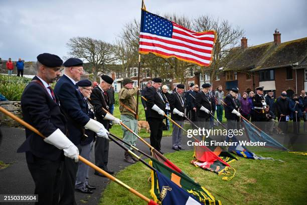 The flag of The united States of America flies during a Remembrance Service to commemorate the 80th anniversary of Exercise Tiger in Victoria...