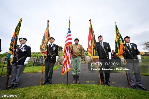Standard Bearers at a Remembrance Service to commemorate the 80th anniversary of Exercise Tiger in Victoria Gardens, on April 26, 2024 in Portland,...