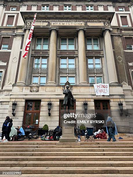 Pro-Palestinian student protestors occupy the front steps of Hamilton Hall at Columbia University in New York City on April 30, 2024. Columbia...