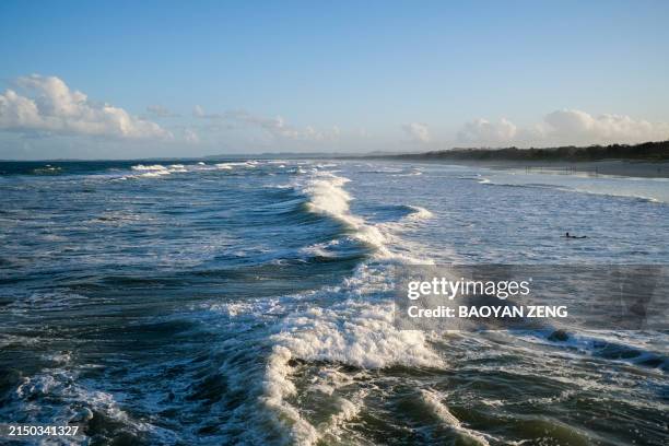ocean shore at windy day, big waves on the water - brunswick heads nsw stock pictures, royalty-free photos & images