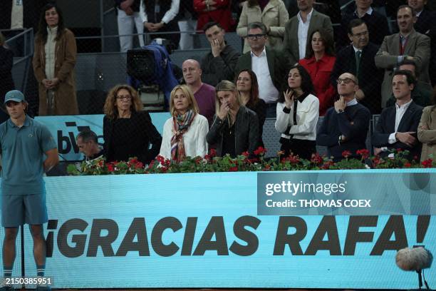 Rafael Nadal's mother Ana Maria Parera, his sister Maria Isabel Nadal and his wife Xisca Perello react after Spain's Rafael lost against Czech...
