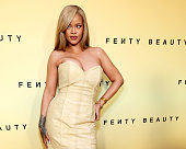 Rihanna Celebrates New Fenty Beauty Soft'Lit Foundation...
