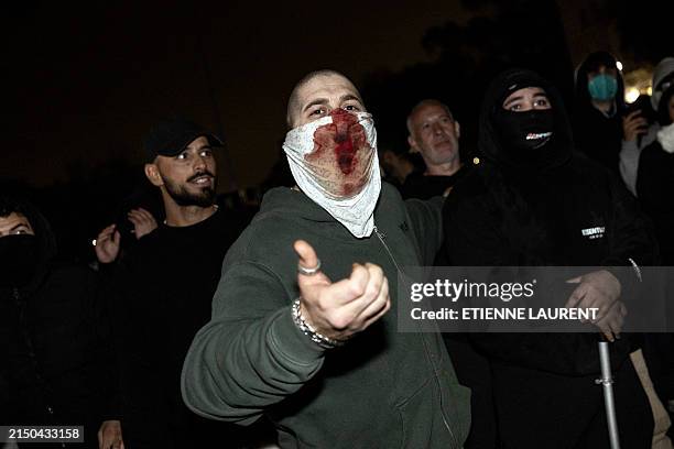 Counter protester shouts at pro-Palestinian protesters at a pro-Palestinian encampment set up on the campus of the University of California Los...