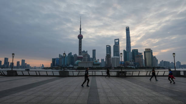 Capturing the Neon Pulse of Shanghai's Bund Waterfront 2 Shanghai Skyline at Night