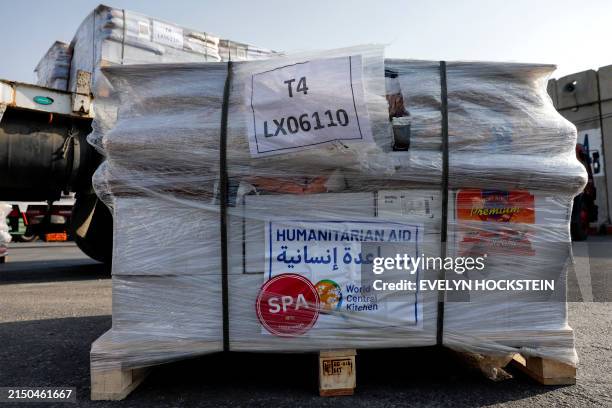 Offloaded boxes of humanitarian aid with the logo of World Central Kitchen are pictured at the Kerem Shalom border crossing with the Gaza Strip in...