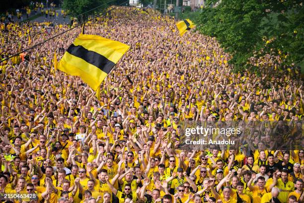 Fans of Dortmund march prior the UEFA Champions League semi-final first leg match between Borussia Dortmund and Paris Saint-Germain at Signal Iduna...
