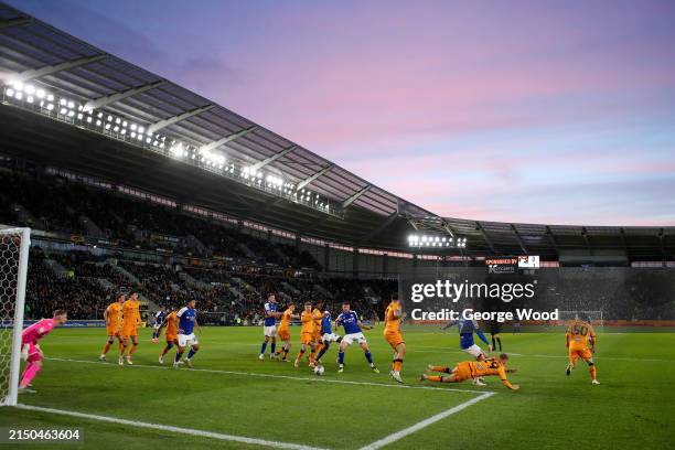 General view of play as the sun sets over the stadium during the Sky Bet Championship match between Hull City and Ipswich Town at MKM Stadium on...