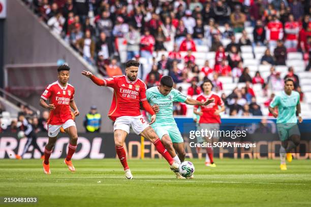 Rafa Silva of SL Benfica with Victor Gomez of Sporting Clube de Braga in action during the Liga Portugal Betclic match between SL Benfica and SC...