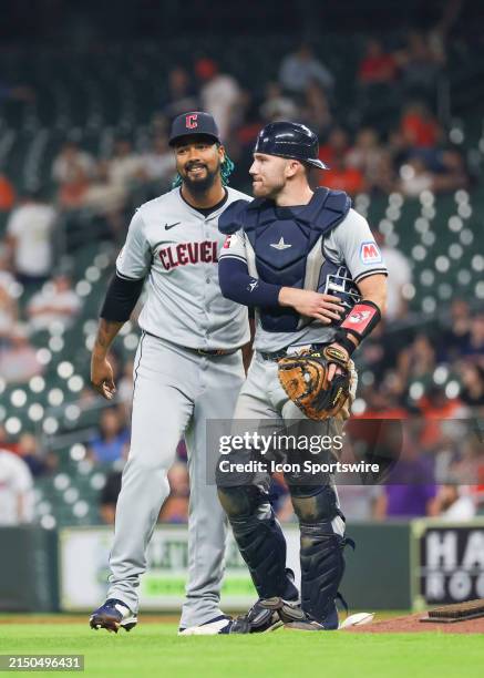 Cleveland Guardians pitcher Emmanuel Clase and Cleveland Guardians catcher David Fry celebrate their 3-2 win in the bottom of the tenth inning during...