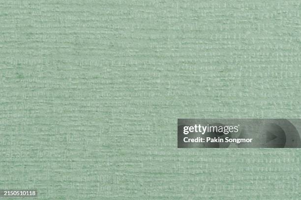 handmade recycled paper made with green tea leaves background, green color. - handmade paper stock pictures, royalty-free photos & images