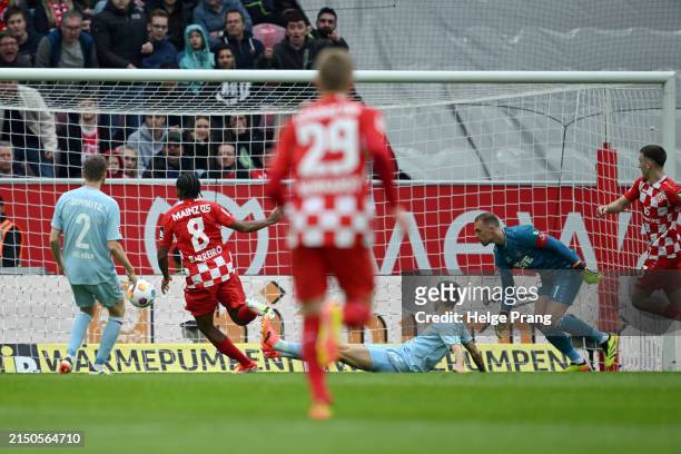 Leandro Barreiro of 1.FSV Mainz 05 scores his team's first goal during the Bundesliga match between 1. FSV Mainz 05 and 1. FC Köln at MEWA Arena on...