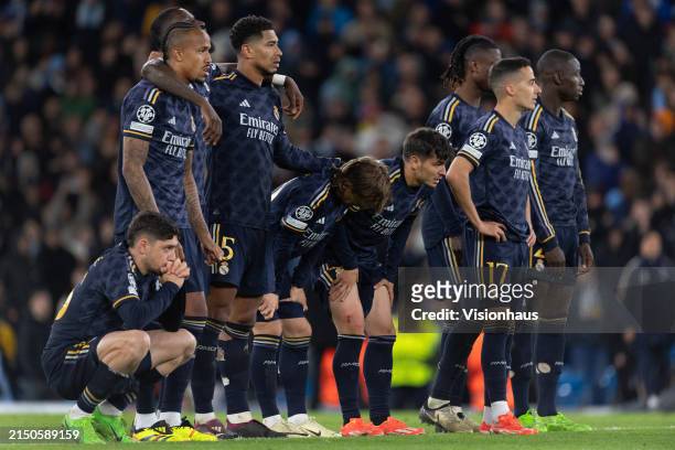 The Real Madrid CF players during the penalty shoot out during the UEFA Champions League quarter-final second leg match between Manchester City and...