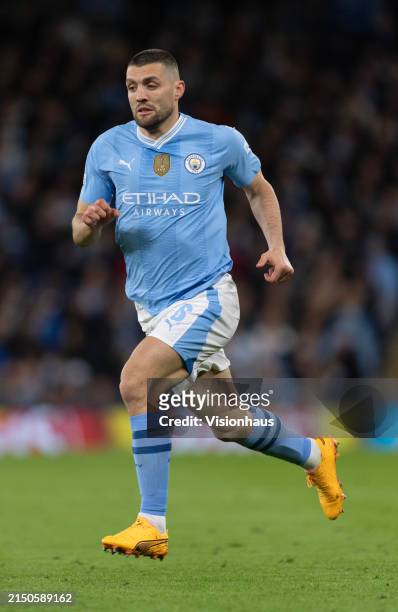 Mateo Kovacic of Manchester City in action during the UEFA Champions League quarter-final second leg match between Manchester City and Real Madrid CF...