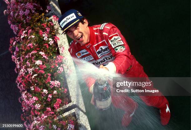 Ayrton Senna of Brazil and McLaren celebrates his fifth success at the legendary Spa circuit during the Belgian Formula One Championship Grand Prix...