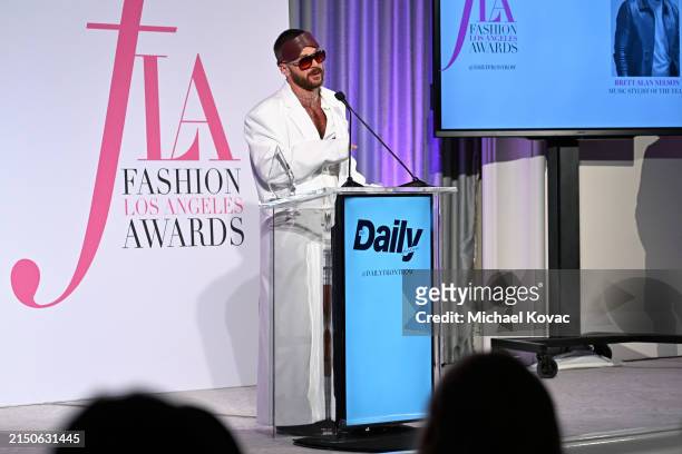 Brett Alan Nelson accepts the award for Music Stylist of the Year onstage during DAOU Vineyards at the Daily Front Row Fashion Los Angeles Awards...
