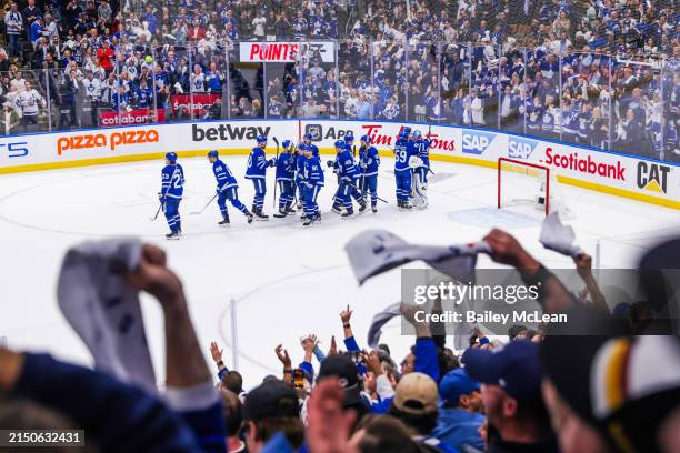 The Toronto Maple Leafs celebrate after defeating the Boston Bruins in Game Six of the First Round of the 2024 Stanley Cup Playoffs at Scotiabank...