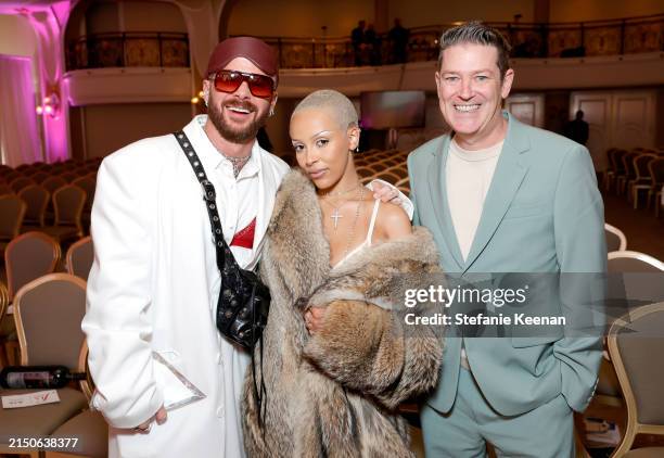 Brett Alan Nelson, Doja Cat, and Eddie Roche attend The Daily Front Row's Eighth Annual Fashion Los Angeles Awards at The Beverly Hills Hotel on...