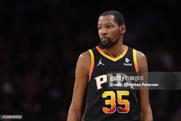Kevin Durant of the Phoenix Suns reacts during the second half of game four of the Western Conference First Round Playoffs at Footprint Center on...