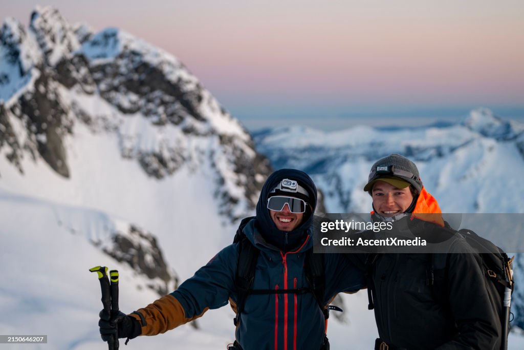 Portrait of ski mountaineers on mountain top