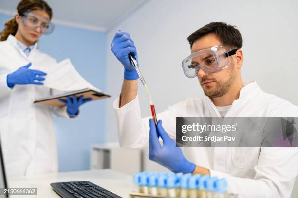 lab technicians doing a research - pathologist computer stock pictures, royalty-free photos & images