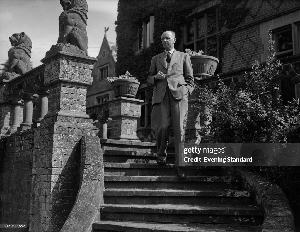 GB Olympics Football Team manager Norman Creek descending steps... News ...