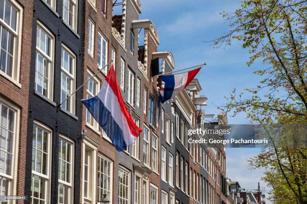 Dutch flags on Amsterdam houses, Netherlands