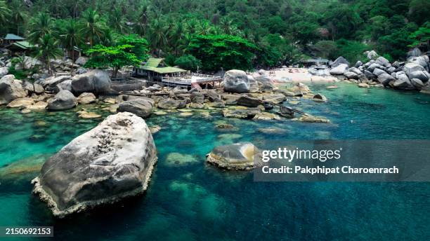 aerial view of "hin wong bay" beach. located on the east coast of koh tao, surat thani province, thailand. the crystal clear waters of “hin wong bay” offers one of the best koh tao snorkeling spots. - turtle island stock pictures, royalty-free photos & images
