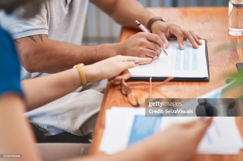 Couple, hands and sign of document, table and legal in office, life cover or insurance with pen. Paperwork, people and agreement of contract, glasses and together for marriage, love and retirement