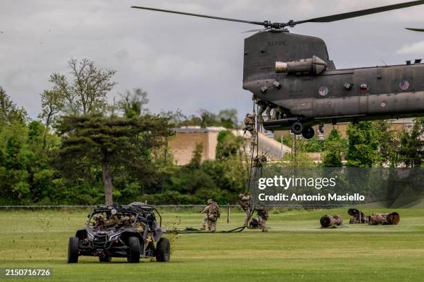 Italian special forces with air support perform during the ceremony to mark the 163rd anniversary of the Italian Army, on May 3, 2024 in Rome, Italy....