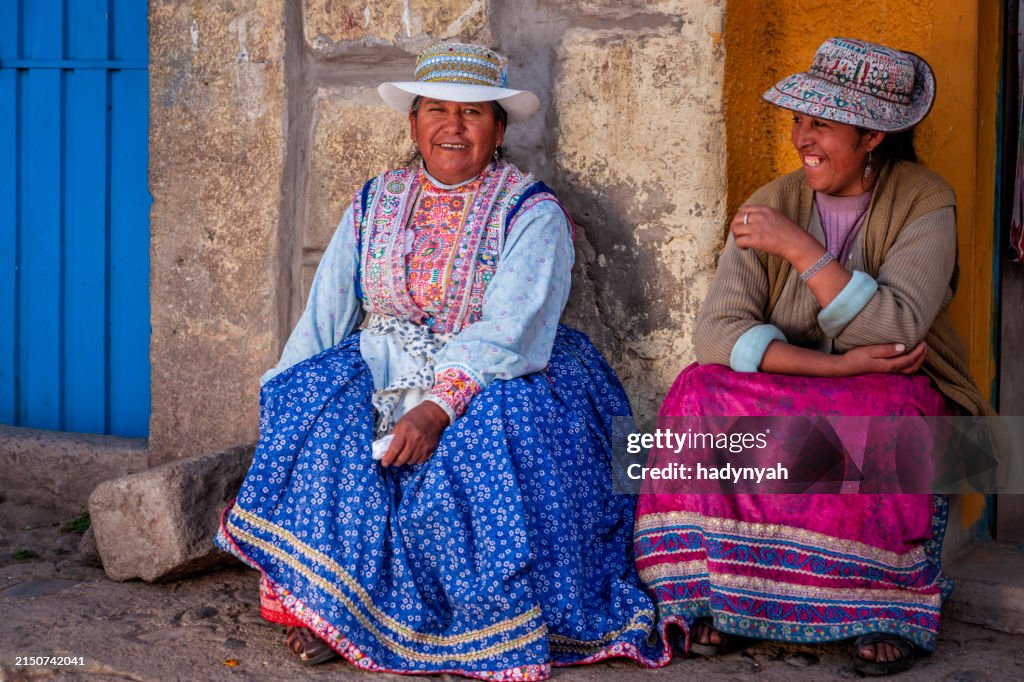 Two happy Peruvian women in national clothing, Chivay, Peru