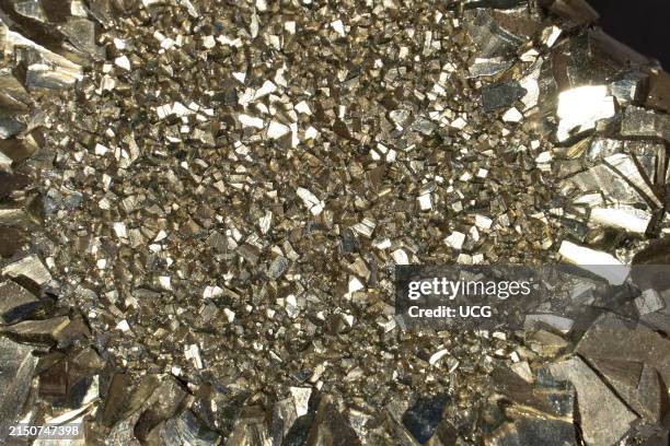 Pyrite crystals, iron sulfide. Photo is 3 inches across.