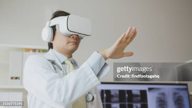 doctor exploring medical data with virtual reality. - virtual instructor stock pictures, royalty-free photos & images