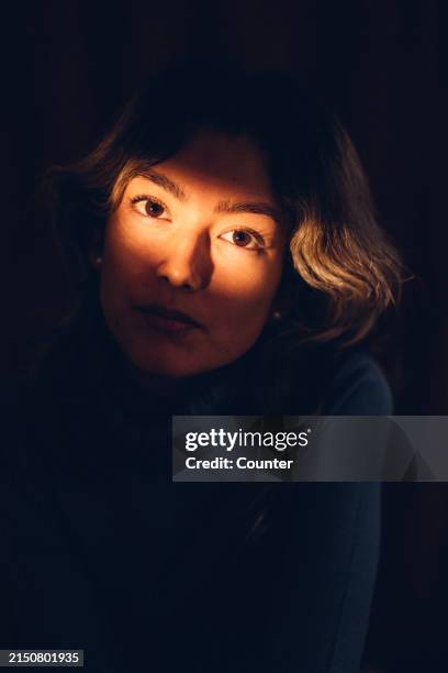 portrait of young multiracial woman at home - high collar stock pictures, royalty-free photos & images