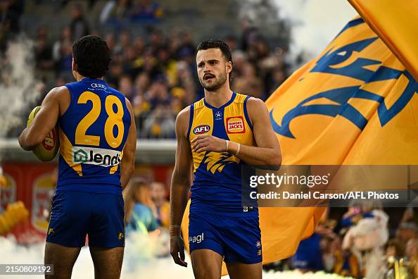 Josh Rotham Josh Rotham of the Eagles enters the arena during the 2024 AFL Round ...