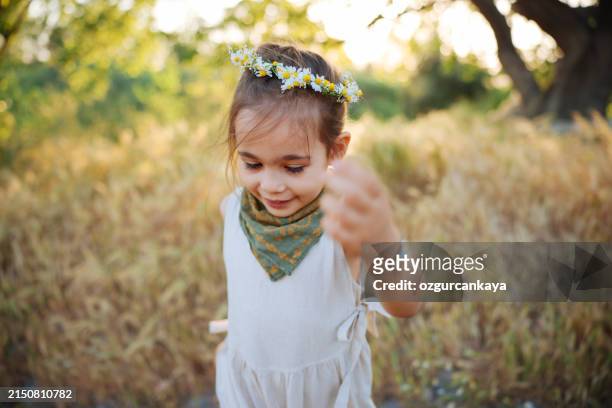 cute little girl having fun time in the nature - kid reaction portrait stock pictures, royalty-free photos & images