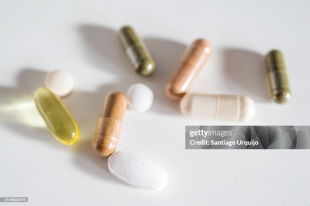 Close-up of mushroom, mineral and omega-3 capsules