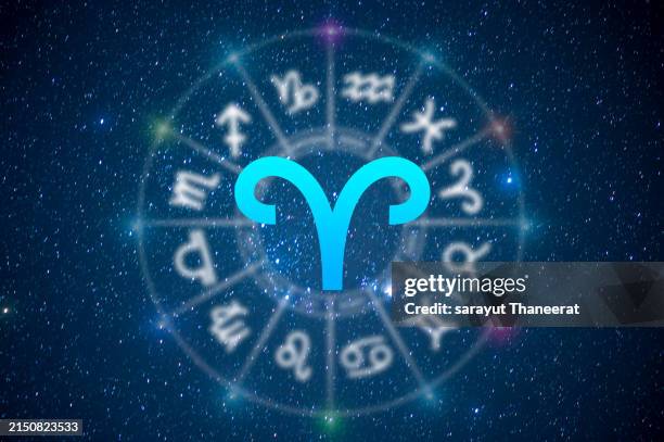 aries astrology and horoscope predictions aries symbol on stars in the universe background light - zodiac water sign stock pictures, royalty-free photos & images