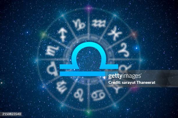 libra astrology and horoscope predictions aries symbol on stars in the universe background light - balance photos et images de collection