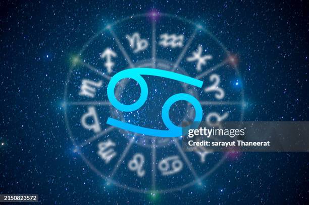 cancer astrology and horoscope predictions aries symbol on stars in the universe background light - sorte imagens e fotografias de stock