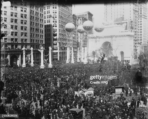 Crowds gather near the Victory Arch at Madison Square on Fifth Avenue and Broadway between 24th and 25th Streets for the homecoming parade for the...