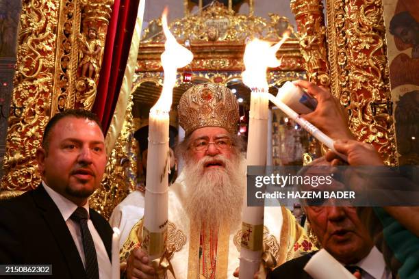 Metropolitan Vindictus, Patriarchal Representative for the Greek Orthodox in Bethlehem, leads the Holy Fire ceremony in Bethlehem's Church of the...