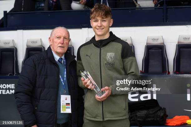 Tony Brown presents Ollie Rostock Academy Player of the Year during the Sky Bet Championship match between West Bromwich Albion and Preston North End...