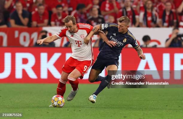 Harry Kane of Bayern Munich is fouled by Toni Kroos of Real Madrid during the UEFA Champions League semi-final first leg match between FC Bayern...