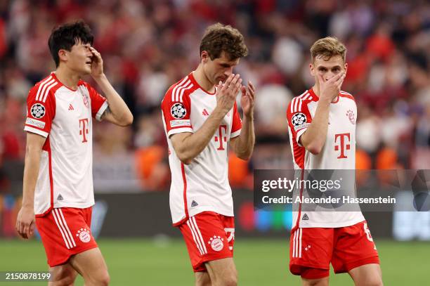 Kim Min-Jae, Thomas Mueller and Joshua Kimmich of Bayern Munich react at full-time following the team's draw in the UEFA Champions League semi-final...