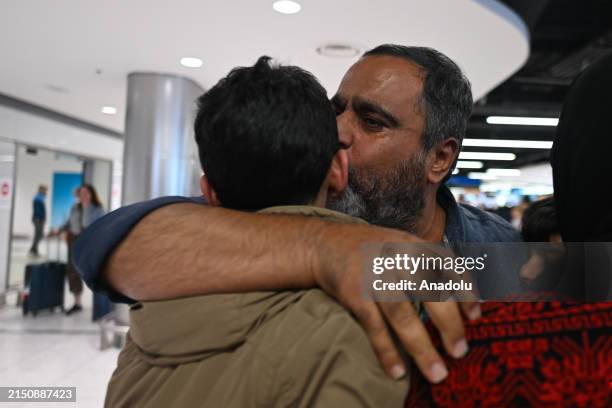 Zak Hania, an Irish-Palestinian, arrives at Dublin Airport, joyously reuniting with his wife, Batoul Hania, and their four Irish-born sons:...