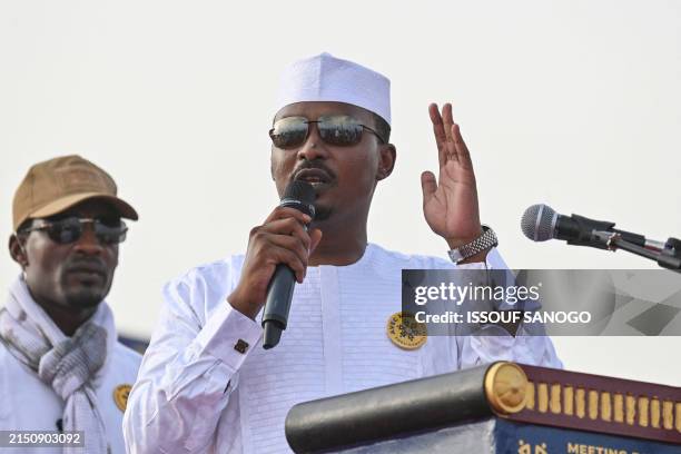 Chad's transitional president and presidential election candidate Mahamat Idriss Deby Itno addresses to crowd at the Place des Nations during final...